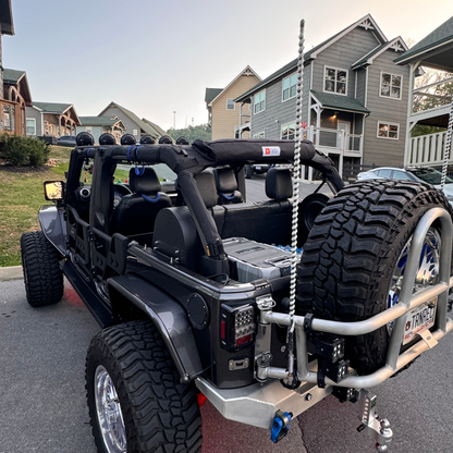 2-in-1 trail cover packed and stored inside 4-door Jeep Wrangler JKU