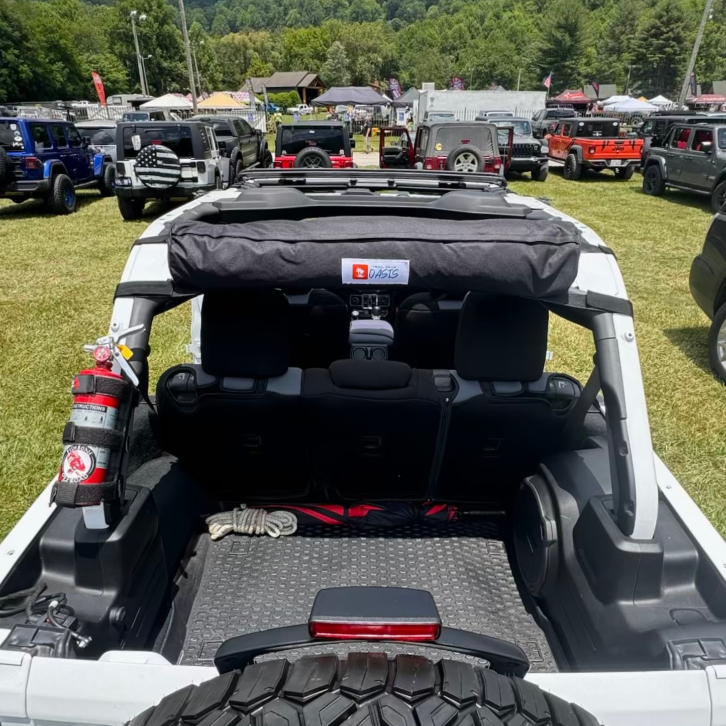 2-in-1 trail cover packed and stored inside 4-door Jeep Wrangler JLU