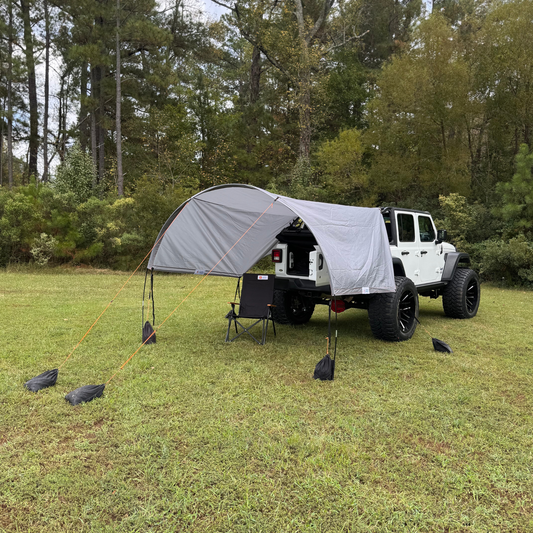 2-in-1 trail cover set up as sun shade on 4-door Jeep Wrangler JLU