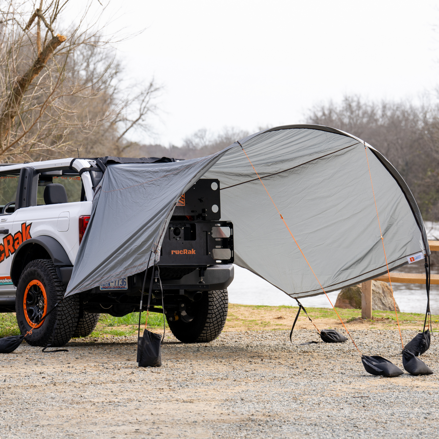 Side view of Bronco 2-in-1 Trail Cover with shade extended
