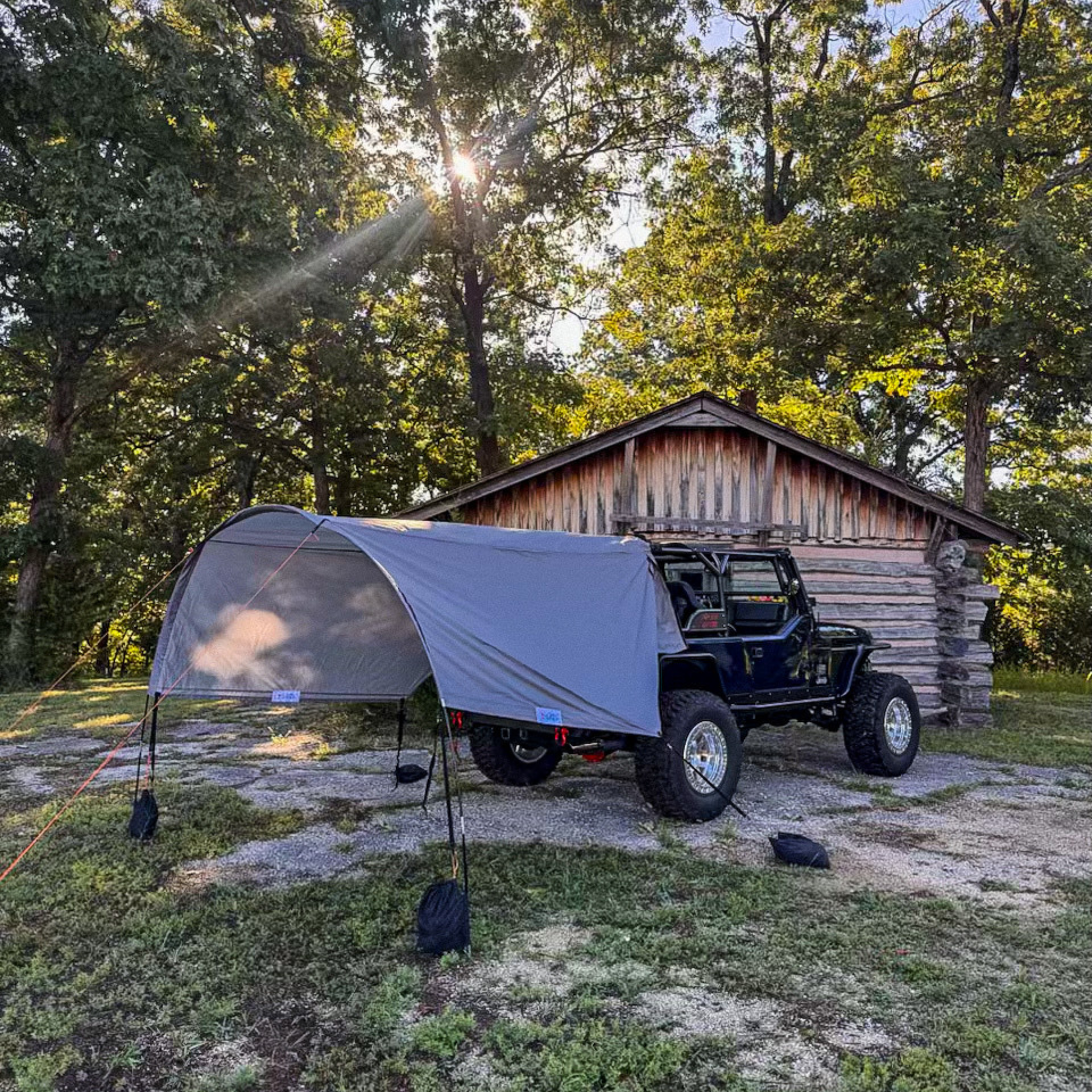 2-in-1 trail cover set up as sun shade on Jeep Wrangler LJ Unlimited