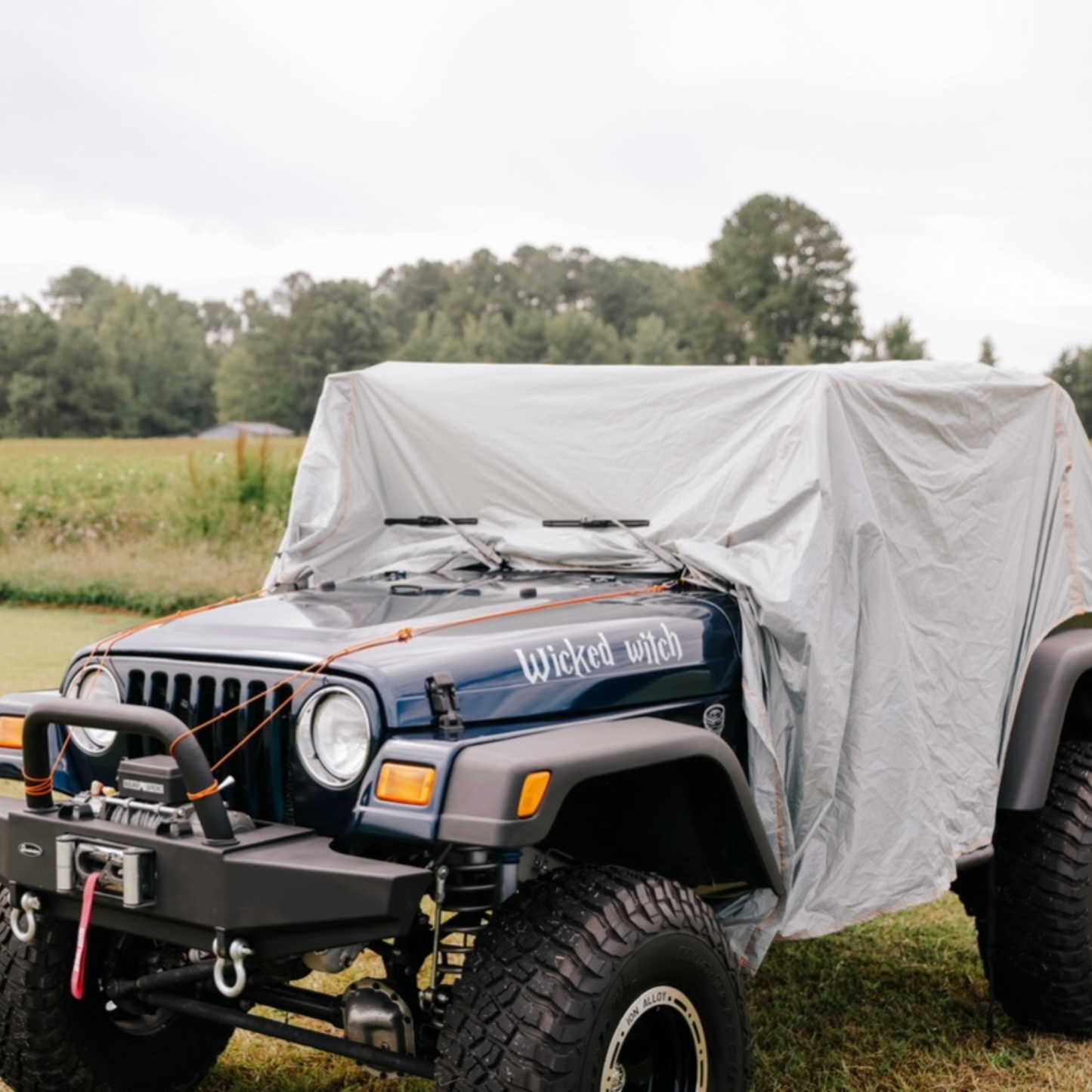 Waterproof rain cover installed on Jeep Wrangler TJ