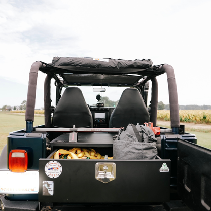 2-in-1 trail cover packed and stored inside Jeep Wrangler TJ