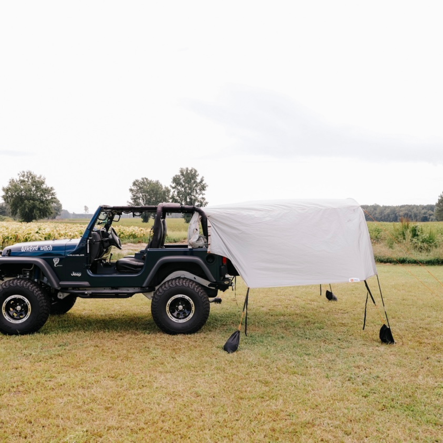 2-in-1 trail cover set up as sun shade on Jeep Wrangler TJ